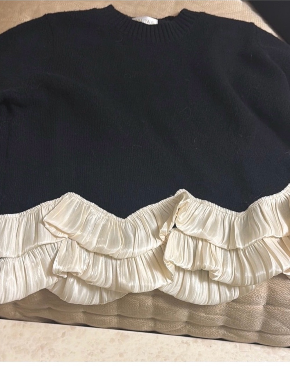 Black Knit Sweater with Cream Ruffle Hem